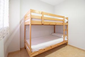 Posteľ alebo postele v izbe v ubytovaní Global Properties, Apartamento con gran terraza y piscina
