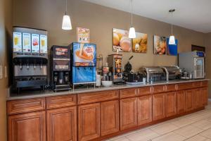 a coffee shop with a counter with aperature at Comfort Inn Romeoville - Bolingbrook in Romeoville