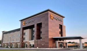 a building with the name of a hotel at La Quinta Inn & Suites by Wyndham Denver Parker in Parker