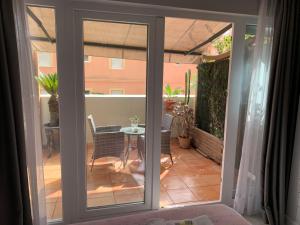 Patio nebo venkovní prostory v ubytování Kentia Rooms