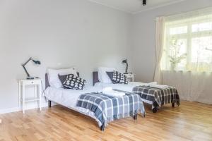 Posteľ alebo postele v izbe v ubytovaní Hornigold Apartament Gdynia