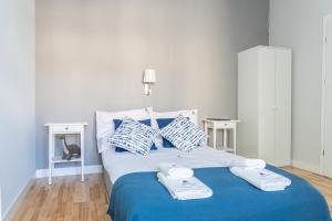 Posteľ alebo postele v izbe v ubytovaní Hornigold Apartament Gdynia