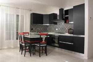 Η κουζίνα ή μικρή κουζίνα στο Appartamento Biba