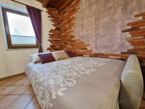 Postel nebo postele na pokoji v ubytování Wine & Apartment VINALES