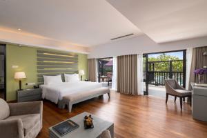 Giường trong phòng chung tại Thaala Bentota