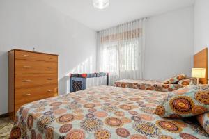 A bed or beds in a room at Villa Rosita