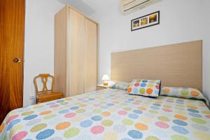 A bed or beds in a room at Villa Rosita