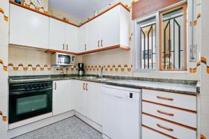 A kitchen or kitchenette at Villa Rosita