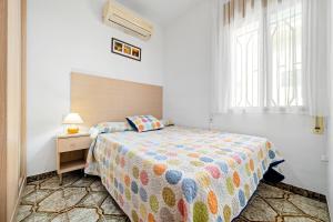 A bed or beds in a room at Villa Rosita Még 22 kép