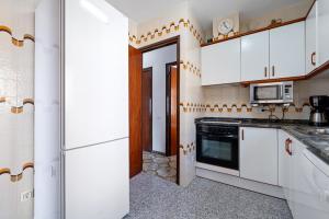 A kitchen or kitchenette at Villa Rosita
