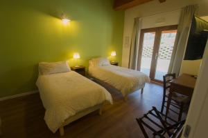 Postel nebo postele na pokoji v ubytování Albergo Diffuso Borgo Retrosi di Amatrice