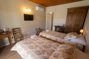 Postel nebo postele na pokoji v ubytování Albergo Diffuso Borgo Retrosi di Amatrice