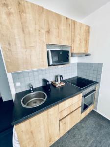 Apartmány Bryksova tesisinde mutfak veya mini mutfak