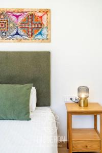 Postel nebo postele na pokoji v ubytování HigueronRentals Mimosa