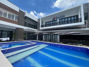 Bazén v ubytování Dampa Poolside Events & Accommodation nebo v jeho okolí