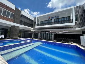 Bazén v ubytování Dampa Poolside Events & Accommodation nebo v jeho okolí