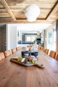 a table with a tray of food on top of it at Chalet Ancolie in Tignes