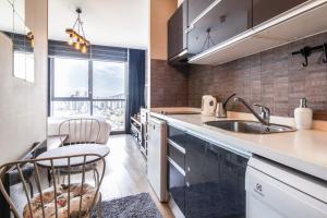 a kitchen with a sink and a counter at Central in Istanbul