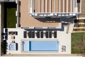 Πισίνα στο ή κοντά στο Ivory Villa, Pool, Heated SpaWhirlpool, Sauna & Gym, By ThinkVilla