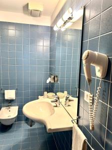 Koupelna v ubytování Hotel Due Torri Tempesta