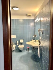 Koupelna v ubytování Hotel Due Torri Tempesta