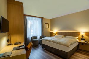 Art Boutique Hotel Monopol客房内的一张或多张床位