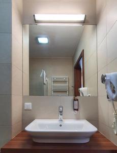 Łazienka w obiekcie Holiday Home Aparthotel z balkonem przy plaży
