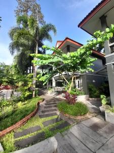 Zahrada ubytování Khaolak Yama Resort - SHA Plus