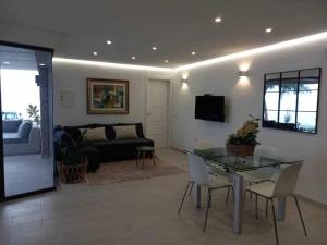 TV a/nebo společenská místnost v ubytování Villa Infinity Vistas Wiffi y jacuzzi