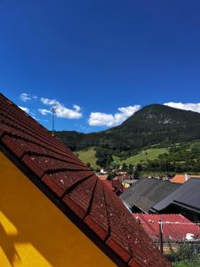 a view of the mountains from a roof at Dovolenkovy dom in Ružomberok