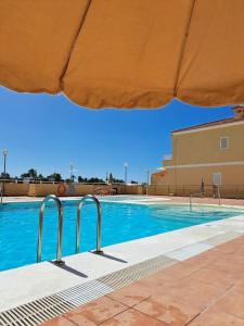 Bazén v ubytování Your place in Arguineguin, Wifi, Swimmingpool and Free Parking nebo v jeho okolí