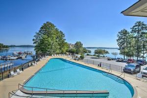 a large swimming pool next to a marina at Captains Hideaway in Salem