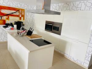 Kuchyňa alebo kuchynka v ubytovaní Olivia Holidayhouse Maspalomas