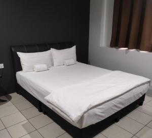 Postel nebo postele na pokoji v ubytování Reintree Lodge Hotel