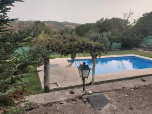 Bazén v ubytování Casa Rural Los Morales nebo v jeho okolí