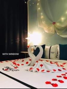 Postel nebo postele na pokoji v ubytování Smile Hotel Wangsa Maju