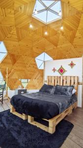 Postel nebo postele na pokoji v ubytování Glamping Reserva del Roble