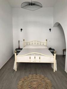 Кровать или кровати в номере Casa do Reguengo 1