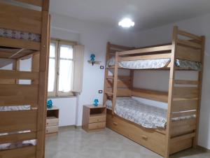 Postel nebo postele na pokoji v ubytování Fòndaco Pietramonte