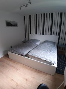 Postel nebo postele na pokoji v ubytování D&D Fewo