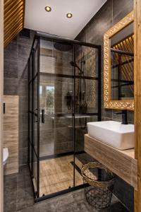 Kúpeľňa v ubytovaní REZYDENCJA SKIBÓWKI sauna&jacuzzi