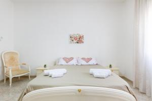 Ένα ή περισσότερα κρεβάτια σε δωμάτιο στο Villetta Sapore Di Mare