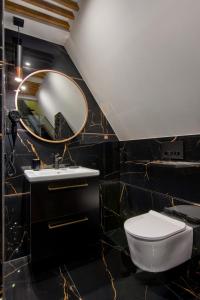 Kúpeľňa v ubytovaní REZYDENCJA SKIBÓWKI sauna&jacuzzi