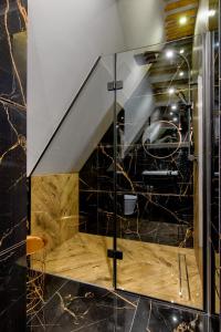 Kúpeľňa v ubytovaní REZYDENCJA SKIBÓWKI sauna&jacuzzi