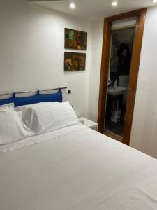 En eller flere senge i et værelse på Il Bardo