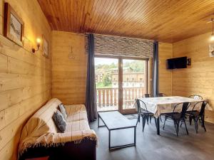 Et tv og/eller underholdning på Appartement spacieux 3 étoiles pour 7 pers. à La Toussuire - FR-1-416-53