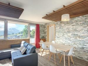 Et opholdsområde på Appartement rénové 8 pers, 4 ch, Lumineux, Centre La Toussuire - FR-1-416-166