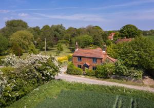 an aerial view of a house in a garden at The Cottage in Hickling