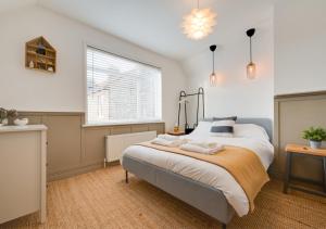 Postel nebo postele na pokoji v ubytování Star Cottage