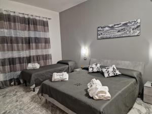 Giường trong phòng chung tại Saint Peter Vatican City confortable Apartament Stellasia casa vacanza